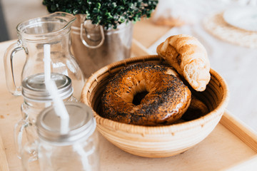 Bagles and croissants on table