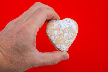 Christmas cookies of vanilla and sugar on red background