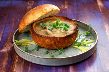 Belarusian mushroom soup in crispy homemade bread