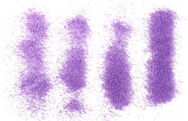 Colorful purple sand, crystals isolated on white background, top view