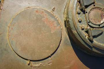Design elements and details of the old Soviet tank. Military green camouflage metal background