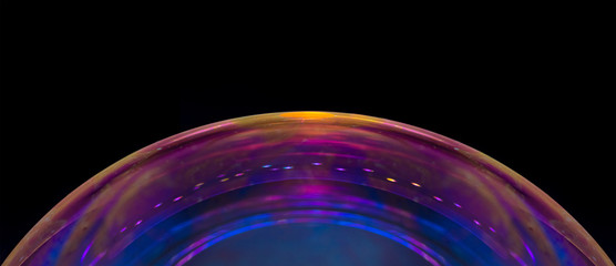 Macro of part of soap sphere on black background