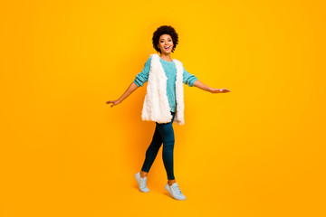 Full length photo of cheerful dream afro american girl have fun relax rest go walk fun wear blue...