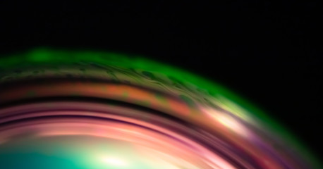 Macro of part of soap sphere on black background