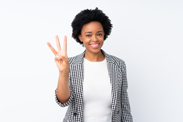 African american woman with blazer over isolated white background happy and counting three with...