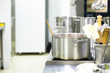 Dishes while cooking in the kitchen in a restaurant. Close-up
