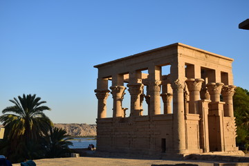 Ancient pharaohs Philae temple in Aswan Egypt in the river nile , old temple have hieroglyphs...