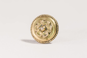 vintage gold colored metal round drawer knob