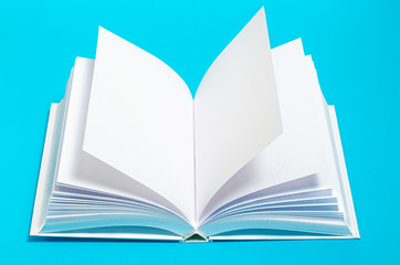 Mockup of opened blank square ctalogue at white design paper background