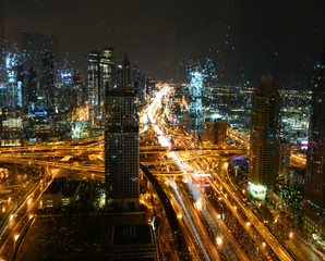 Fototapeta na wymiar Dubai city views during heavy rains at night from the hotel window in January 2020