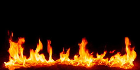 Fire flames and Smoke on black background. Image of blaze fire flame texture and burning fire for decorative special effect .
