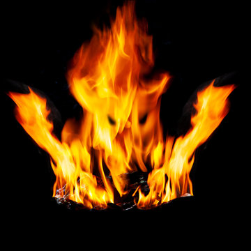 Fire flames and Smoke on black background. Image of blaze fire flame texture and burning fire for decorative special effect .