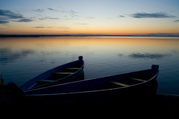 Sunrise... two boats on lake