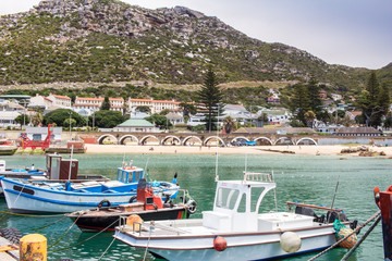 Fototapeta na wymiar Fishing boats at Kalk Bay harbour - South Africa