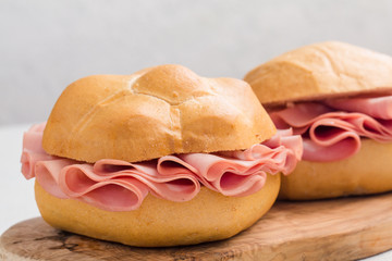 Mortadella sandwich. Mortadella Bologna - a large italian sausage or luncheon  with meat. Tipycal...