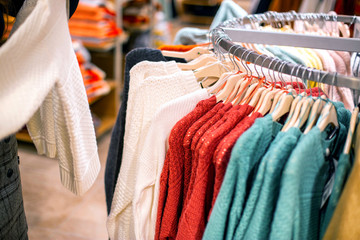 Selling and buying warm items in store for the autumn and winter season. Fashionable and stylish jackets and sweaters are sold in the store, fashionable