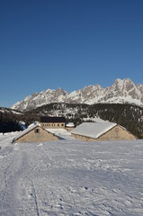 winter ski chalet and cabin in snow mountain