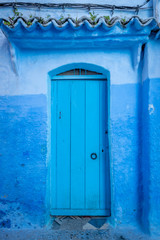 Blue door and wall in Chefchaouen, Morocco