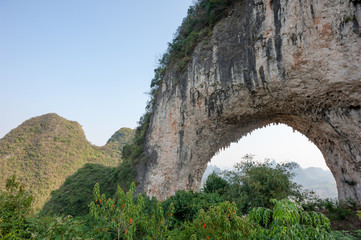 Moon hill arch karst formation in Yangshuo, Guilin, Guangxi province, China