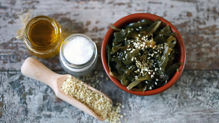 Sea kale with sesame seeds and olive oil. Healthy seafood. Omega 3. Trace elements. Diet food.