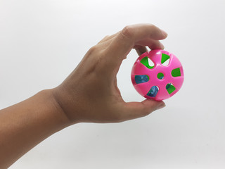 Various Colorful Cute Plastic Balls Design with Bells Ringer Sound Inside for Children or Pet Toys and Educational Purpose in White Isolated Background