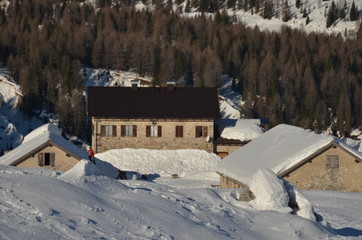 winter ski chalet and cabin in snow mountain