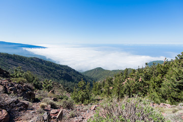 Beautiful landscape on clouds and the ocean from above. Tenerife Island, Canary Islands, Spain