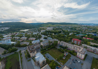 Aerial view of Satka city and mountains. Chellyabinsk region, Russia. Summer, evening