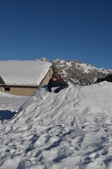 Children slide down hills