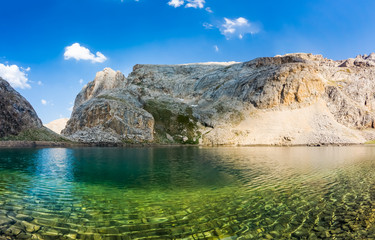 The view of mountain lake between Bolkar Mountain and Taurus Mountain. Karagol, Nigde, Turkey. It is known black lake. Volcanic crater. Travel background.