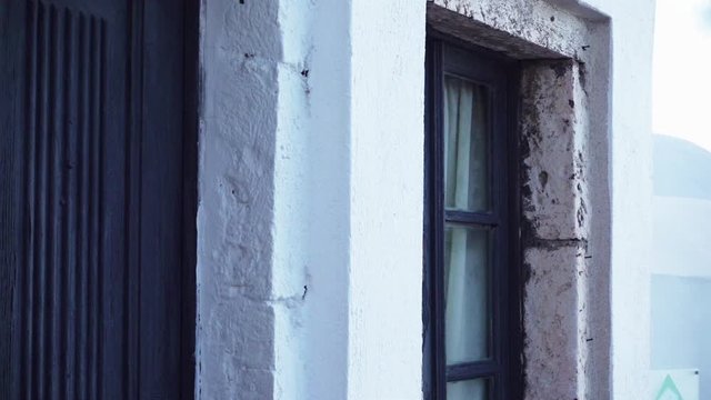 Medium Shot Of A Dark Blue Door On A Mediterranean House