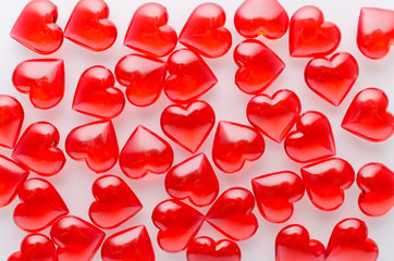 red hearts pattern on white background, flat lay