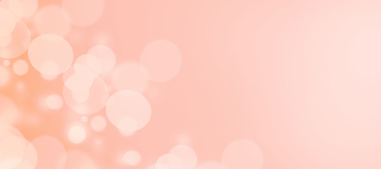 Delicate pink abstract background with blurry bokeh circles. The atmosphere of the holiday and love magic.