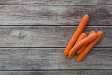 carrots on wooden table