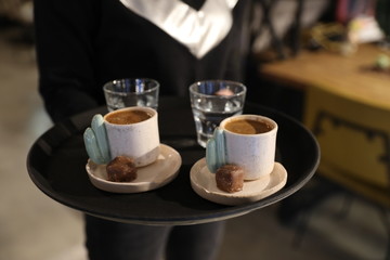 Drinks and food posers in a cafe