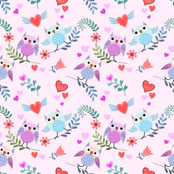 Valentines seamless pattern with cute owl  heart shape and flowers.