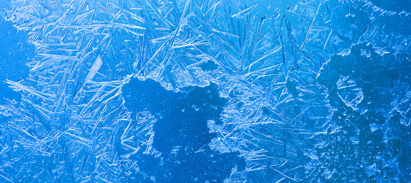 Abstract Ice Flowers Pattern, Frosted Window Macro View Background. Cold Winter Weather Xmas Backdrop