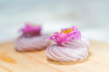 Traditional Thai desserts sweet and delicious : Beautiful candy with flower shaped. "A-lua or Allure" Thai handmade candy, Selective focus.