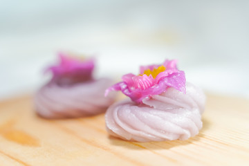 Fototapeta na wymiar Traditional Thai desserts sweet and delicious : Beautiful candy with flower shaped. 