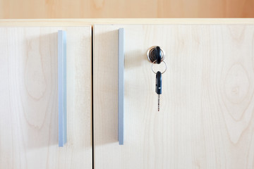 Key in office cabinet drawer lock