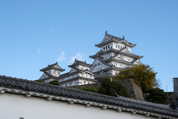 Fototapeta na wymiar Beautiful white Himeji Castle in autumn season in Hyogo Prefecture, Japan