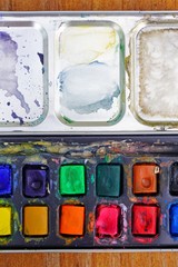 A colorful palette of watercolor artist paints