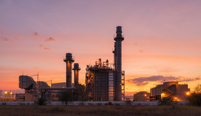Fototapeta na wymiar Power plant on sunset sky.