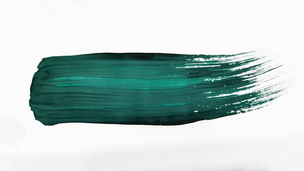 Turquoise thick brush stroke isolated on a white background.