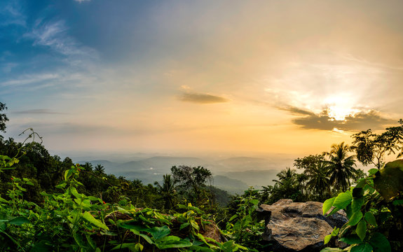 Best Place to see in Kannur Kerala Vazhamala Beautiful sunset view nature scenery green mountain with trees travel and tourism image