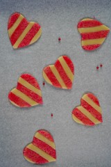 Homemade striped heart cookies / Valentines day background