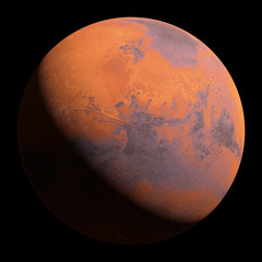 Naklejka premium planet Mars in natural colors isolated on black background