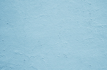 Texture of pale blue old stucco on the wall.