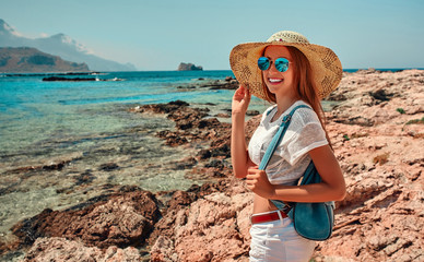 Tourism, travel, vacation on the rocky sea.