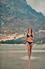 Tourism, travel, vacation on the rocky sea.